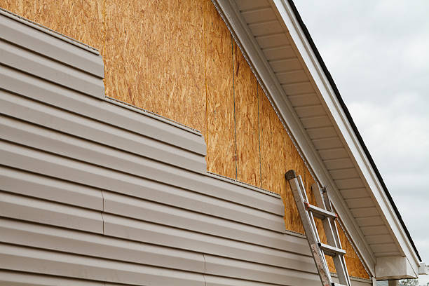 Professional Siding Replacement technician working in Alexis, NC